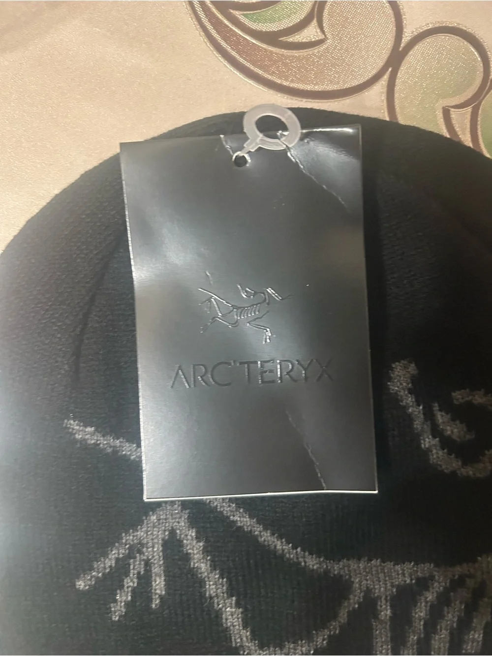 Arc'teryx Black Beanie with Gray Skeleton Graphic
